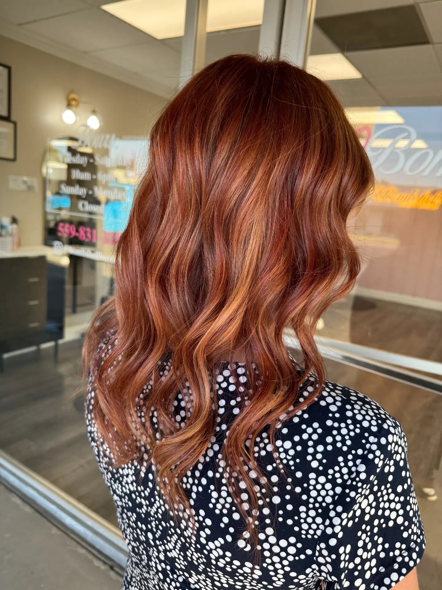 Medium-long wavy copper-red hair