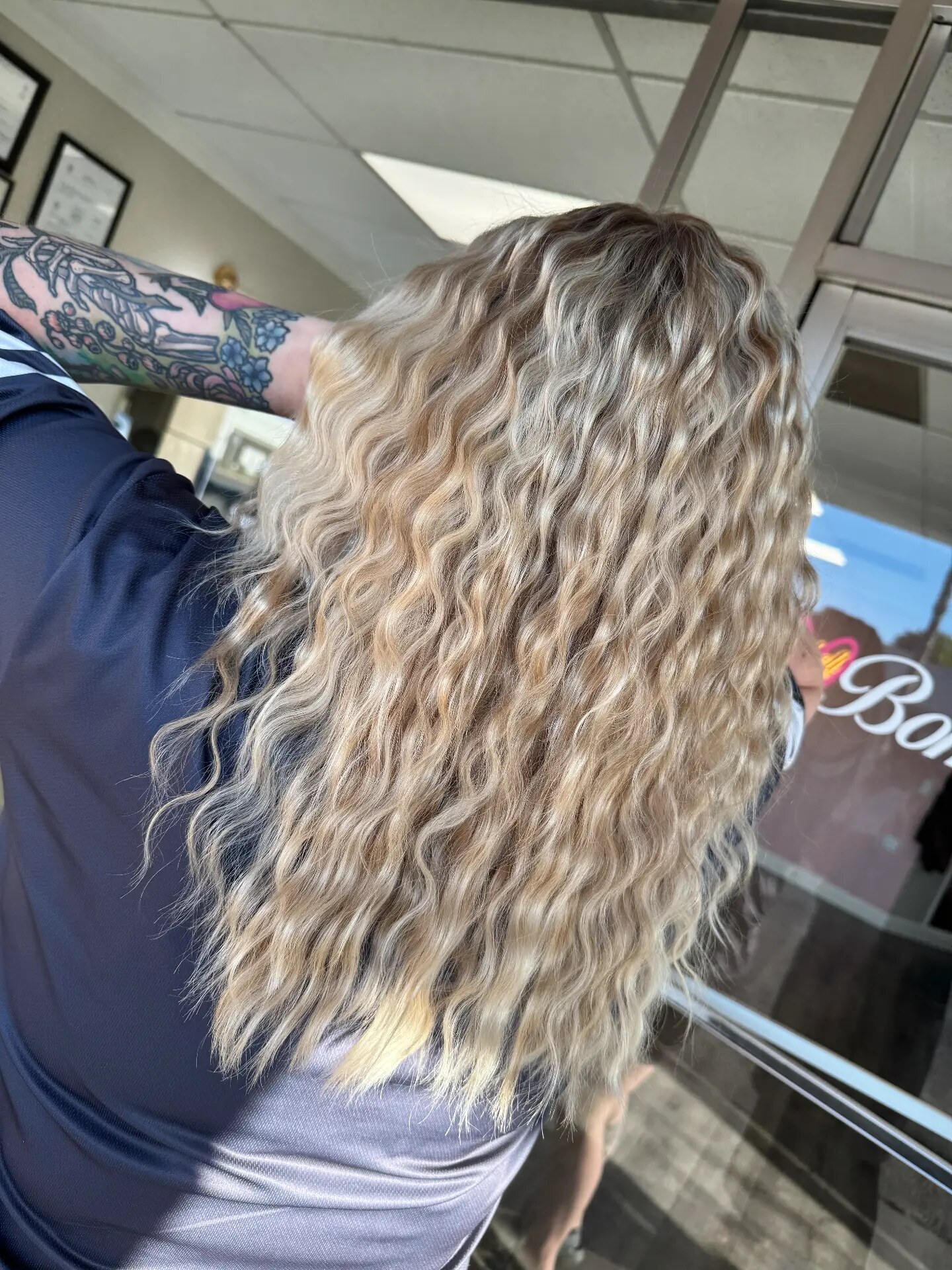 Long crimped light blonde hair